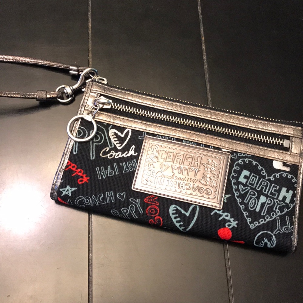Coach Poppy black graffiti wristlet